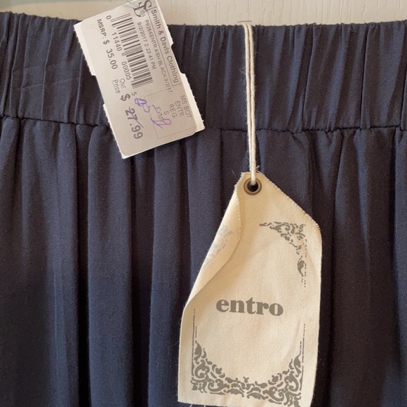 Black pants with ruffled skirt overlay - Picture 4 of 4